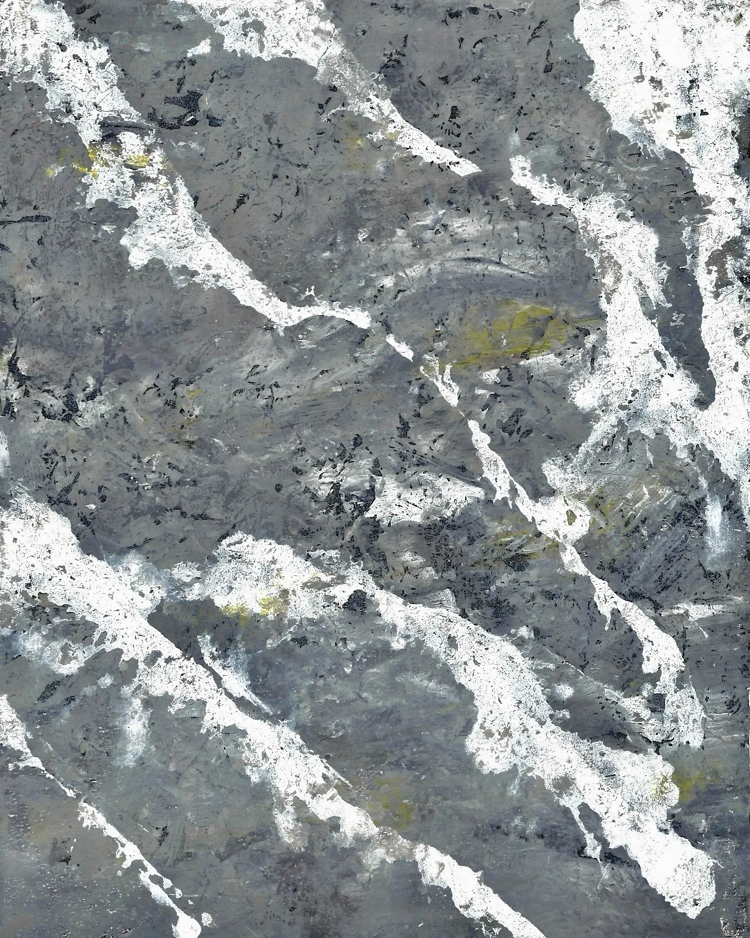 Grey stone-like ground crossed by bold white veining, with small ochre-yellow patches near the center.